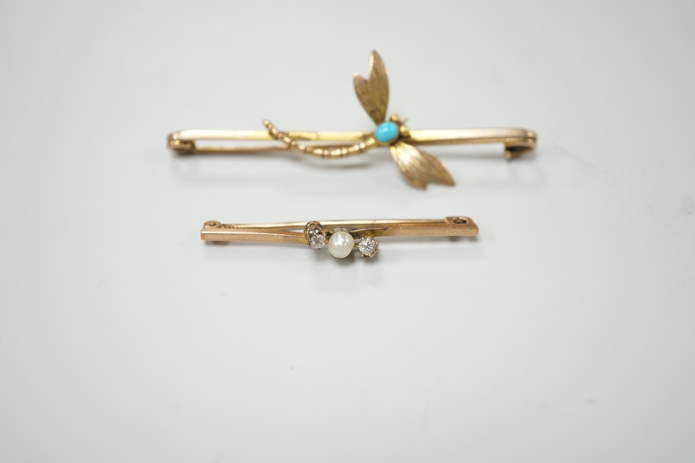 Two early 20th century yellow metal and gem set bar brooches, including turquoise set dragonfly, 64mm